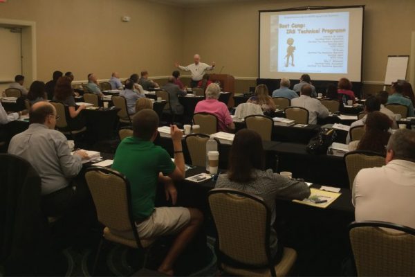 Larry Lawler in front of the room teaching